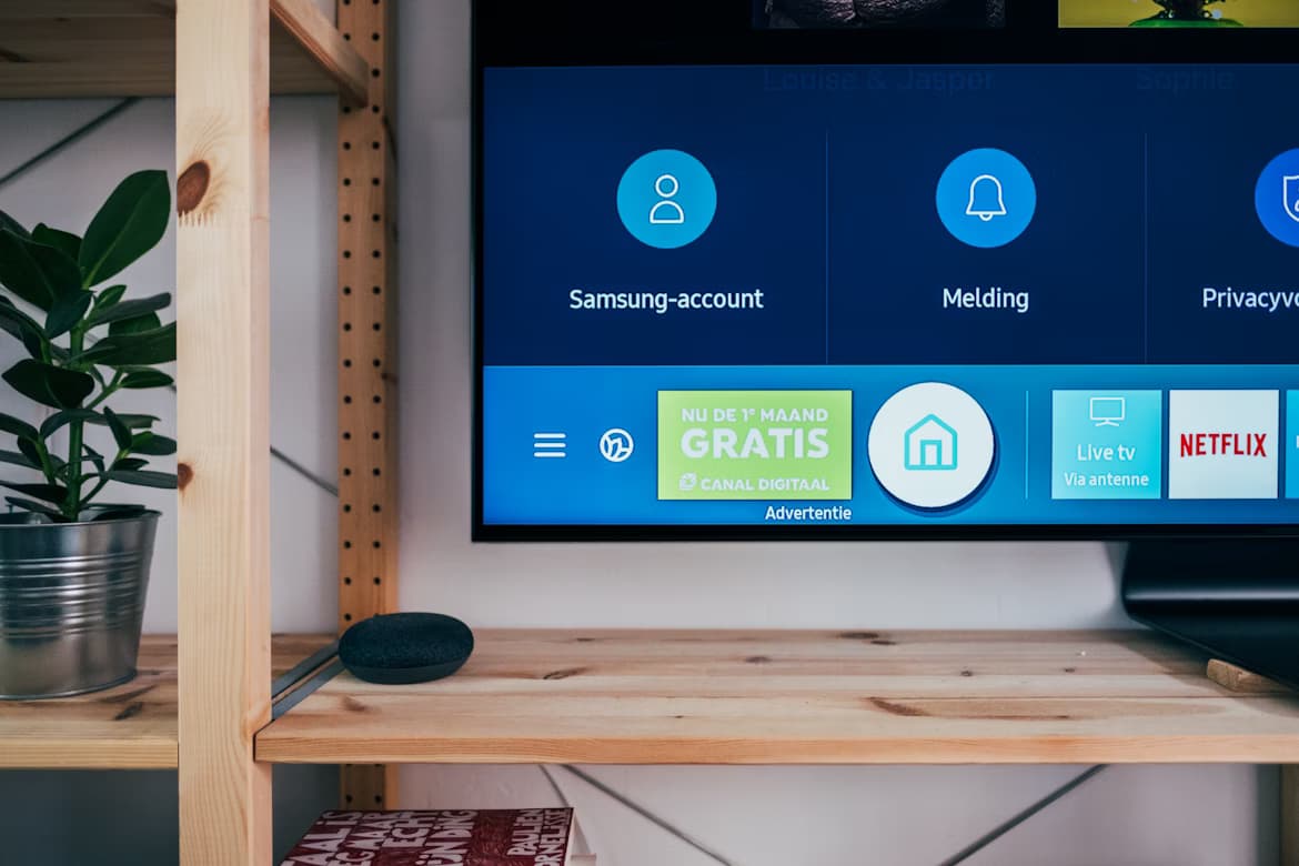 Professional TV repair technician fixing LED TV screen in Gujarat